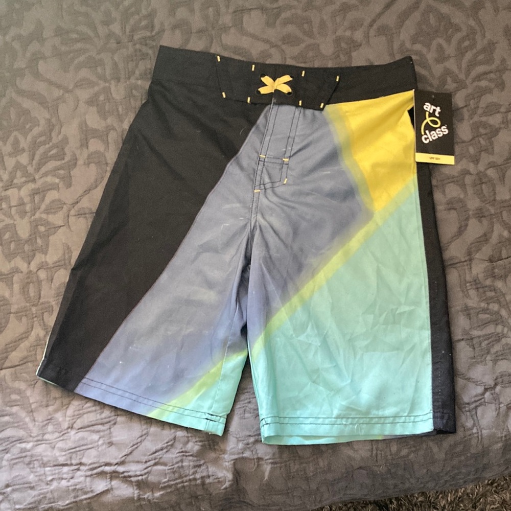 Swimming trunks, size 12 multicolored never worn, brand new with tags